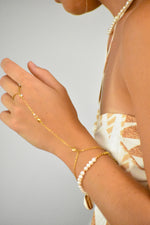 Load image into Gallery viewer, a bracelet with a ring attached
