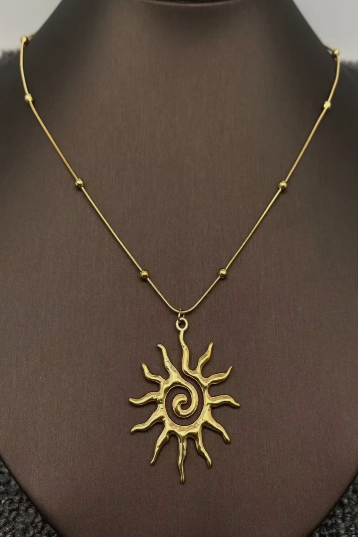 Sun charm necklace