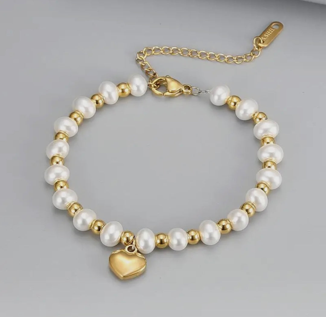 Stainless Steel Heart Pendant Pearl
Beaded Bracelet