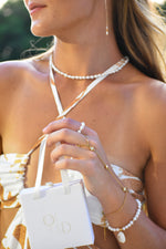 Load image into Gallery viewer, a bracelet with a ring attached
