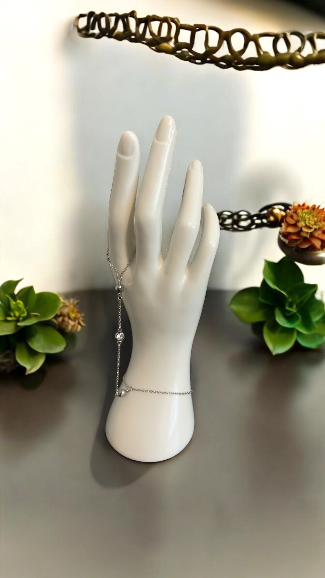 a bracelet with a ring attached