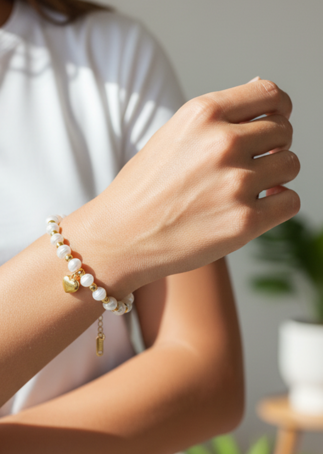 Stainless Steel Heart Pendant Pearl
Beaded Bracelet