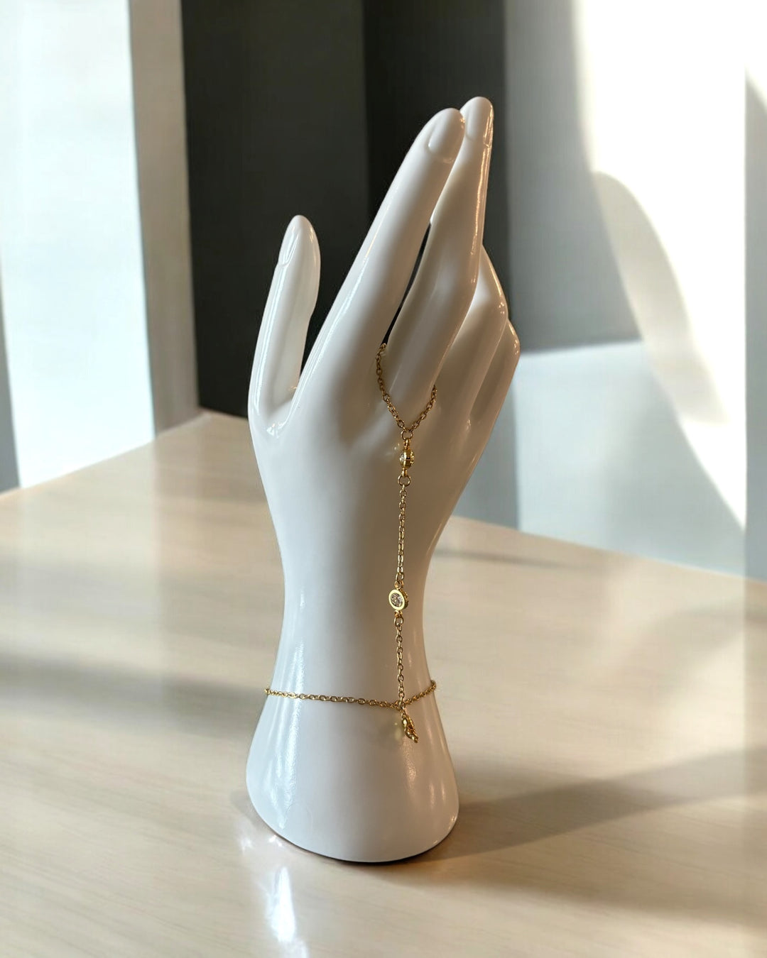 a bracelet with a ring attached