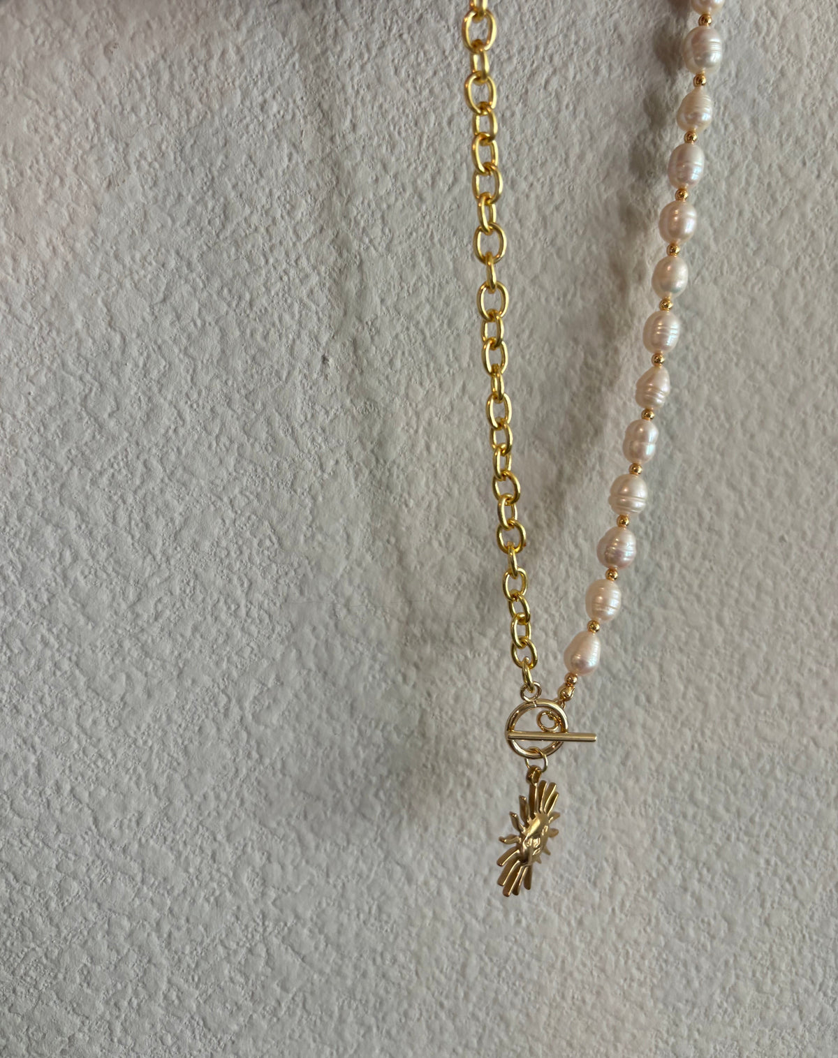￼ half big chain half pearls, with sun pendant