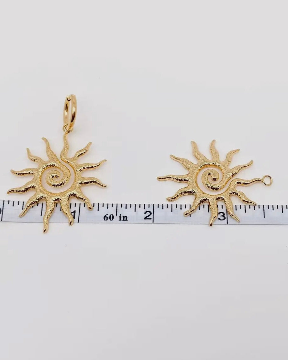 Spiral sun design huggie earrings